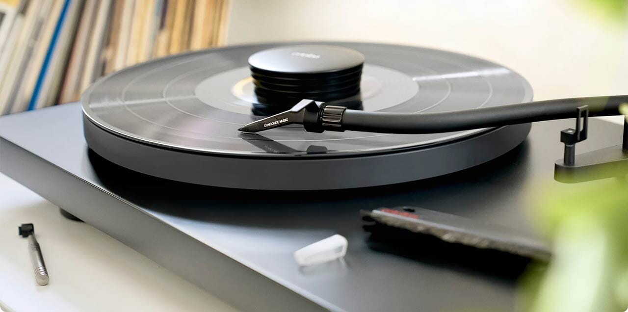 Concorde_Music_Black_on_Pro-Ject_turntable_01_-_rounded_corners_2e317f54-3699-476f-baf1-c3feb635b745.jpg